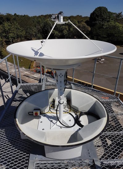 Radome removed from land-based antenna to show 1.5m parabolic dish antenna, scalar feed horn and LNB