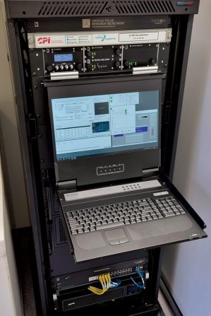 Dartcom X-Band EOS System equipment cabinet with rack-mounted PCs and KVM console installed on Oden